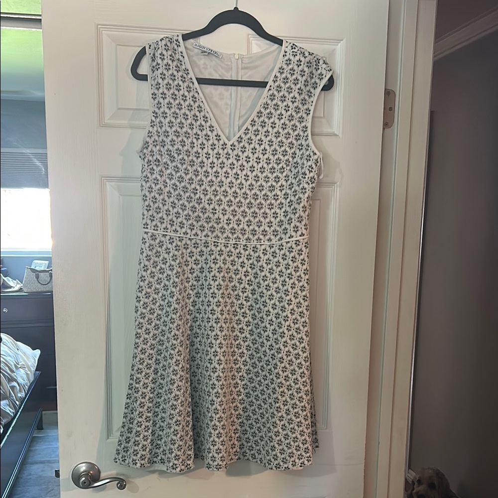 Elegant White and Black Lace Patterned Dress